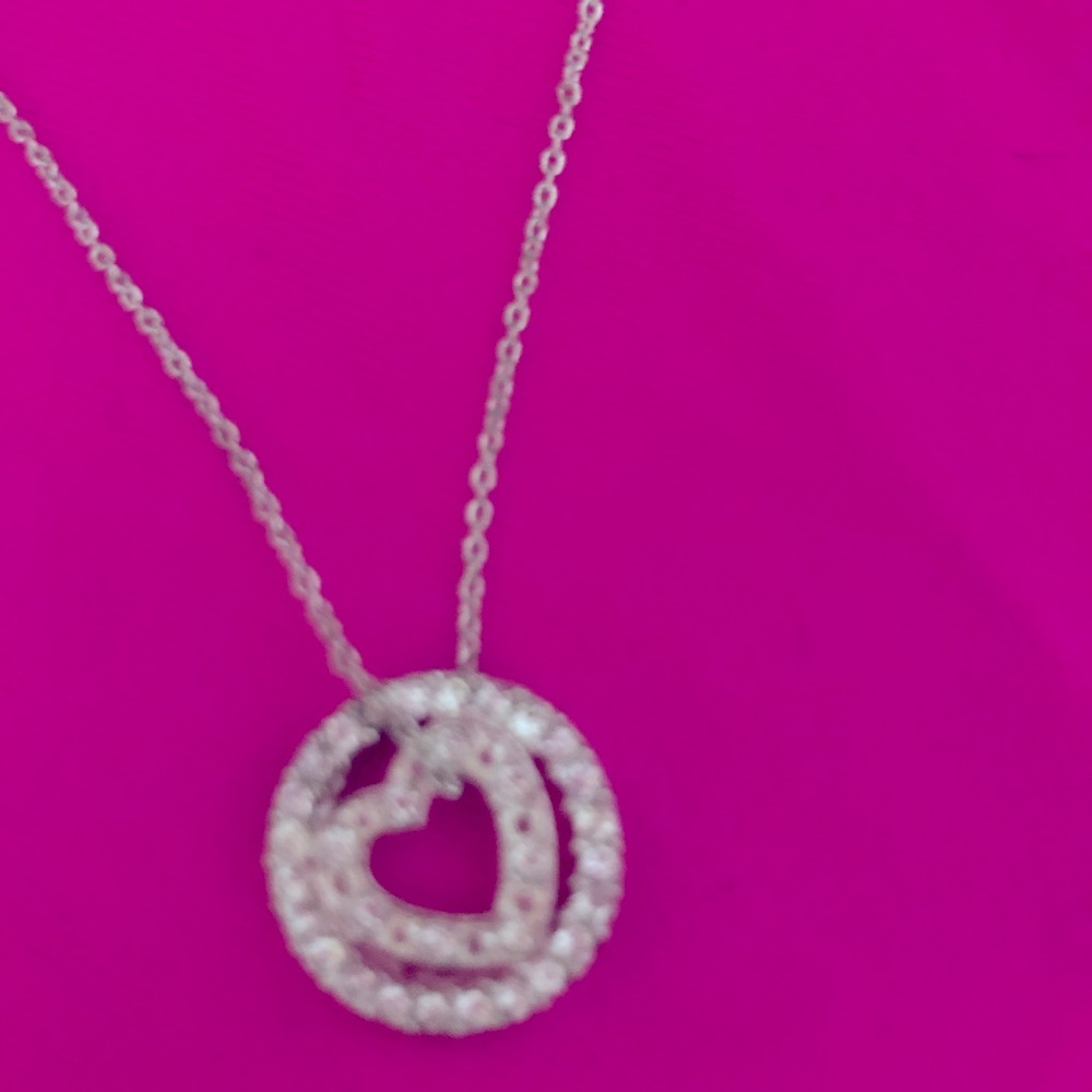 Eternity circle/ floating heart Swavorski Crystal and silver necklace